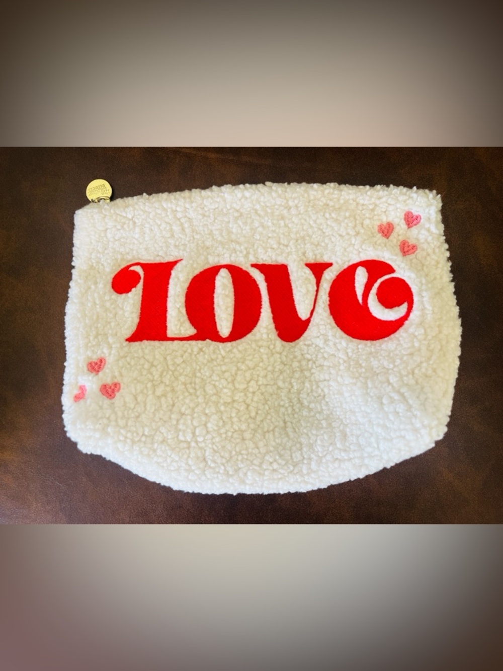 The Darling Effect LOVE Sherpa Pouch in Cream with Red Lettering